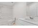 Bright bathroom featuring a sink with chrome fixtures, and a shower-tub combo at 10943 Ketchikan St, Las Vegas, NV 89179