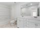 Bright bathroom featuring dual sinks, tile floors, and shower-tub combo with shower head at 10943 Ketchikan St, Las Vegas, NV 89179