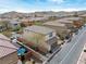 Attractive two-story home with a tile roof, garage, rear patio, and minimal landscaping at 10943 Ketchikan St, Las Vegas, NV 89179