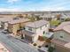 Beautiful home showcasing a tile roof, garage, rear patio, and low-maintenance landscaping at 10943 Ketchikan St, Las Vegas, NV 89179