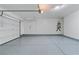 Spacious garage with epoxy floor and an automatic garage door opener at 10943 Ketchikan St, Las Vegas, NV 89179