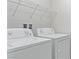 Laundry room featuring appliances and wire shelving above at 10943 Ketchikan St, Las Vegas, NV 89179