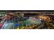 Nighttime aerial view of a driving range featuring colorful lights at 125 E Harmon Ave # 2220, Las Vegas, NV 89109