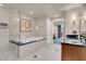 Well-lit bathroom featuring a soaking tub, walk-in shower, and modern fixtures at 125 E Harmon Ave # 2220, Las Vegas, NV 89109