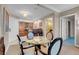 Living room with a dining table, kitchen and hallway views at 125 E Harmon Ave # 2220, Las Vegas, NV 89109