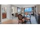Cozy living room with comfortable seating and a glass table with views at 125 E Harmon Ave # 2220, Las Vegas, NV 89109
