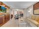 Living room features a comfortable living space and kitchen with a breakfast bar at 125 E Harmon Ave # 2220, Las Vegas, NV 89109