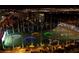 Spectacular night view of the city and driving range with lit targets at 125 E Harmon Ave # 2220, Las Vegas, NV 89109