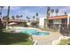 Inviting pool area with comfortable seating, lush landscaping, and a relaxing atmosphere at 1405 Vegas Valley Dr # 114, Las Vegas, NV 89169