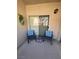 Comfortable balcony with seating and a small table, perfect for relaxing outdoors at 1725 Queen Victoria St # 103, Las Vegas, NV 89144