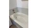 Bathroom showcasing a soaking tub with stylish backsplash at 1725 Queen Victoria St # 103, Las Vegas, NV 89144