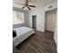 Clean bedroom with hardwood floors, closet, and plenty of natural light at 1725 Queen Victoria St # 103, Las Vegas, NV 89144