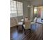 This dining area offers natural light and access to an outdoor patio for relaxed living at 1725 Queen Victoria St # 103, Las Vegas, NV 89144