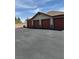 Row of private garages offering ample parking and storage space for residents at 1725 Queen Victoria St # 103, Las Vegas, NV 89144