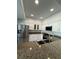 Bright kitchen features granite countertops, stainless steel appliances, and ample cabinet space at 1725 Queen Victoria St # 103, Las Vegas, NV 89144