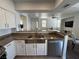 Lovely kitchen featuring granite counters, stainless appliances, and modern fixtures at 1725 Queen Victoria St # 103, Las Vegas, NV 89144