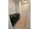 Laundry room features tile flooring, and Samsung washer and dryer units at 1725 Queen Victoria St # 103, Las Vegas, NV 89144