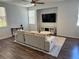 Comfortable living room featuring a plush sofa, contemporary rug, and recessed lighting at 1725 Queen Victoria St # 103, Las Vegas, NV 89144