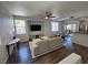 Bright living room with an open floor plan and updated furnishings, perfect for entertaining at 1725 Queen Victoria St # 103, Las Vegas, NV 89144