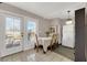 Bright dining area with French doors leading to the outdoor space and a chandelier at 1813 Constantine Ave, Las Vegas, NV 89101