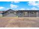 Charming single-story home with a covered porch and a spacious driveway at 1813 Constantine Ave, Las Vegas, NV 89101