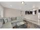 Comfortable living room with stylish decor, opening to the kitchen and dining area at 1813 Constantine Ave, Las Vegas, NV 89101