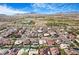 High aerial view of the neighborhood featuring well-maintained homes and desert landscape at 182 Horizon View Dr, Henderson, NV 89015