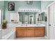 Bright bathroom featuring a double sink vanity with ample counter space and a large mirror at 182 Horizon View Dr, Henderson, NV 89015