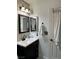 Updated bathroom with a modern vanity and a stylish square-tile backsplash at 182 Horizon View Dr, Henderson, NV 89015