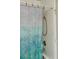Close up of a shower with white tiles and curtain at 182 Horizon View Dr, Henderson, NV 89015
