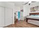 Bedroom with wood floors, natural light, and neutral decor at 182 Horizon View Dr, Henderson, NV 89015