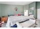 Spacious bedroom with a decorative tree, bench, and ample natural light at 182 Horizon View Dr, Henderson, NV 89015