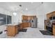Bright and airy kitchen features stainless steel appliances, tile backsplash, and island seating at 182 Horizon View Dr, Henderson, NV 89015
