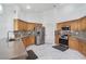 Well-lit kitchen featuring stainless steel appliances and stylish tile backsplash at 182 Horizon View Dr, Henderson, NV 89015
