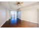 Bright bedroom with hardwood floors and a large window offering city views at 200 W Sahara Ave # 1810, Las Vegas, NV 89102