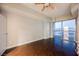 Inviting bedroom featuring hardwood floors, ample light, and city views at 200 W Sahara Ave # 1810, Las Vegas, NV 89102