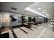 Hallway with stylish marble flooring, crystal chandeliers, wall mirrors, and accent benches at 200 W Sahara Ave # 1810, Las Vegas, NV 89102