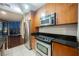 Well-equipped kitchen with stainless steel appliances and granite countertops at 200 W Sahara Ave # 1810, Las Vegas, NV 89102