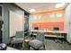Comfortable workspace features designer chairs, wall art, multiple clocks and two computer stations at 200 W Sahara Ave # 1810, Las Vegas, NV 89102