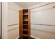 Efficiently organized walk-in closet with shelving and hanging rods at 200 W Sahara Ave # 1810, Las Vegas, NV 89102