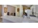 Bright kitchen with white appliances, countertops, and ample cabinet space offers a clean, modern look at 2105 High Mesa Dr, Henderson, NV 89012