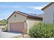 The garage has solar panels, a new door and a freshly painted exterior with easy access at 2156 Shadow Canyon Dr, Henderson, NV 89044