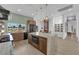 Gourmet kitchen featuring an expansive island, stainless steel appliances, and a stunning view at 2160 Pueblo Cir, Las Vegas, NV 89169