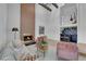 Cozy living room with brick fireplace and open access to a bar area at 2160 Pueblo Cir, Las Vegas, NV 89169
