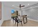 Office space with golf course view, modern decor, and a contemporary wooden table at 2160 Pueblo Cir, Las Vegas, NV 89169