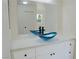 Bathroom featuring a modern vanity with a blue vessel sink and large mirror at 220 N David St, Pahrump, NV 89060