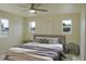 Nicely decorated bedroom with three windows, stylish decor, and natural light at 220 N David St, Pahrump, NV 89060