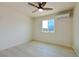 Bedroom with natural light and a ceiling fan provides a calming atmosphere at 220 N David St, Pahrump, NV 89060