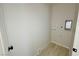 A compact laundry room is ready for a washer and dryer at 220 N David St, Pahrump, NV 89060