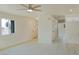 Inviting living room with neutral walls, bright windows and light flooring at 220 N David St, Pahrump, NV 89060
